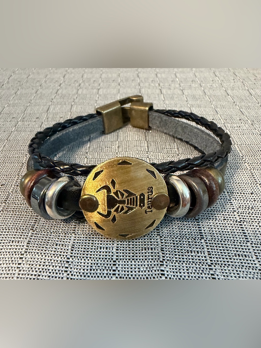 Black Leather Taurus Bracelet with Brass Accent